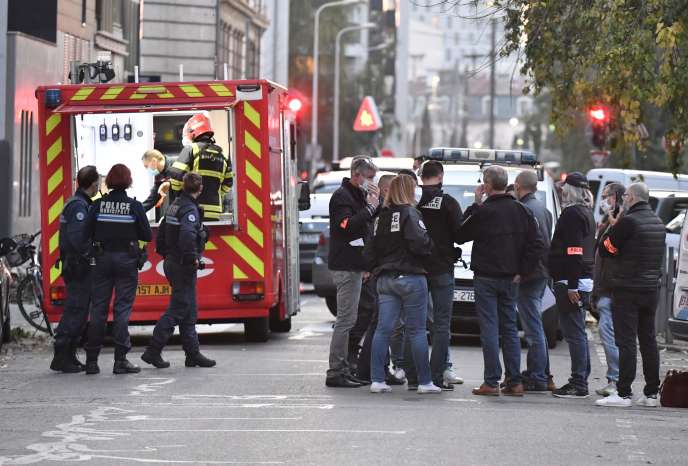 Investigators present in front of the Greek Orthodox Church in Lyon, where the attack on a priest took place, Saturday, October 31.