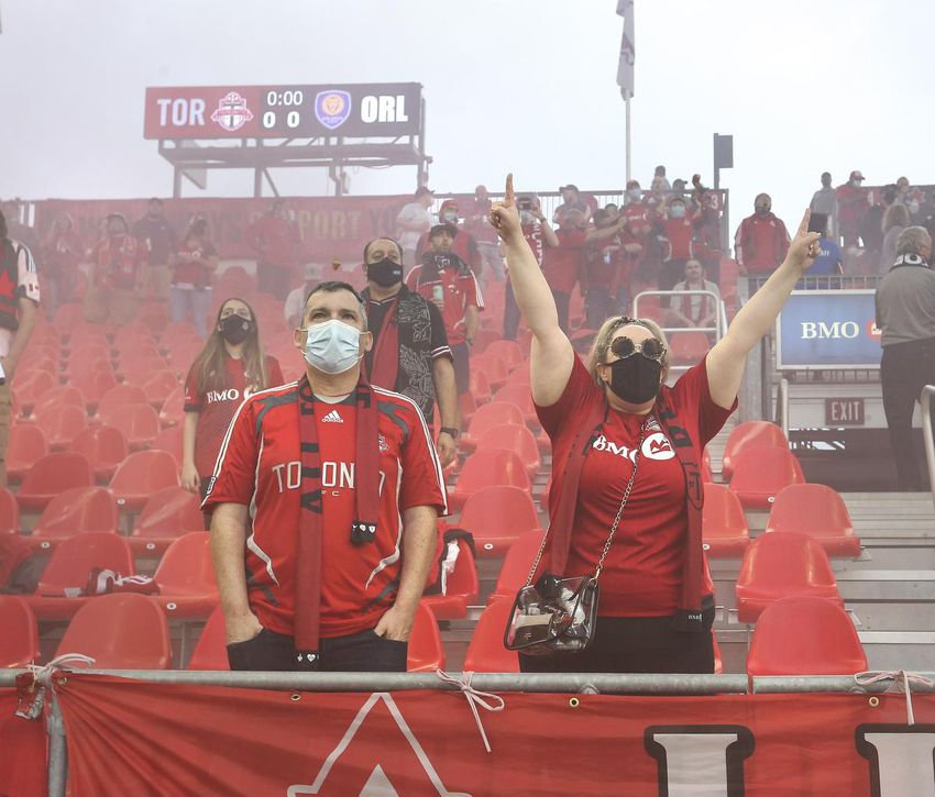 Do Toronto FC fans show their support before the team's first game in front of the spectators?  About 7,000 of them saw the 1-1 draw against Orlando City SC?  in more than a year.