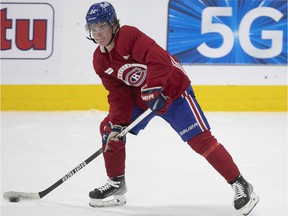 Cole Caufield suffered an upper body injury during warm-up before Sunday's Reds-Whites game at the Bell Center.