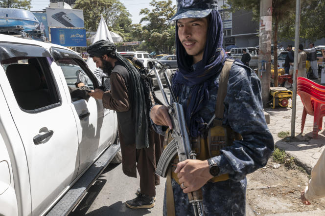 Taliban check drivers in central Kabul, Afghanistan, September 15, 2021.