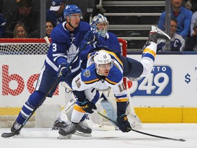 Winger Zach Sanford, up front, seen here at a Blues game against the Maple Leafs in 2019, played US college hockey with Senators center Colin White.