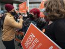 NDP leader Jagmeet Singh is greeted by supporters as he arrives in downtown Vancouver on Monday, September 20, 2021.