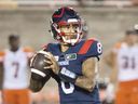 Montreal Alouettes quarterback Vernon Adams Jr. prepares a shot during the second half of CFL soccer action against the BC Lions in Montreal, Saturday, Sept. 18, 2021.