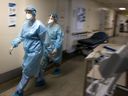 Nurses conduct rounds inside Verdun Hospital's COVID-19 unit in February.