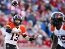 BC Lions quarterback Mike Reilly throws a pass during a CFL game against the Stampeders in Calgary on August 12.