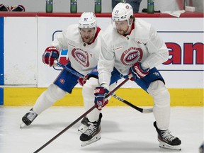 Montreal Canadiens' Jonathan Drouin, left, and Josh Anderson play during training camp on September 23, 2021 in Brossard.