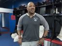 Montreal Alouettes' John Bowman speaks to journalists as players clean their lockers in Montreal on November 11, 2019.