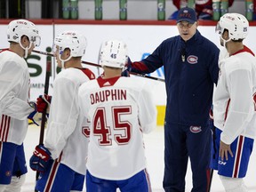 Canadiens head coach Dominique Ducharme talks to players during practice Wednesday at the Bell Sports Complex in Brossard.
