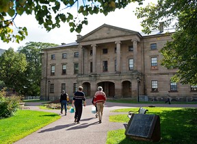 Tourists visit the province house in Charlottetown.