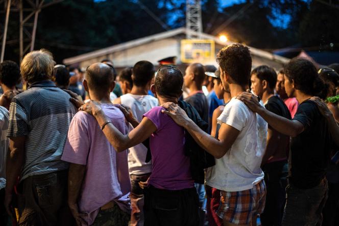 Men suspected of drug trafficking and drug users surrender to police in Manila, the Philippines, June 22, 2016.