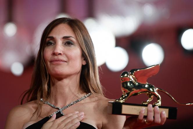French director Audrey Diwan poses with the Golden Lion received for her film “L'Evénement”, at the Venice Film Festival, on September 11, 2021.