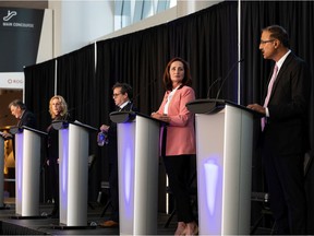 Mayoral candidates (left to right) Rick Comrie, Kim Krushell, Michael Oshry and Cheryll Watson and Amarjeet Sohi are seen on stage during the Downtown Business Association's The Future of Downtown Mayoral Forum at Ford Hall on Rogers Place in Edmonton, Thursday in September.  23, 2021. Candidate Mike Nickel was invited, but did not appear.