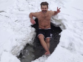 Firefighter Wes Bauman broke a hole in the ice near Whitemud Creek one night to enjoy this dip and says that understanding how to regulate body systems can help people manage stress levels.  He has taught many classes and would like scientists to take a closer look at how this happens.