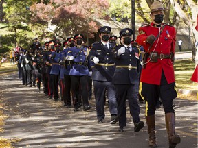 Officers participate in the 23rd annual Police and Peace Officers Memorial Day ceremony on Sunday, Sept. 26, 2021, in Edmonton.