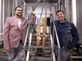 Adam Corsaut, president of Analog Brewing Company, with main brewer Lisa Drapaka on Sunday, Sept. 26, 2021, in Edmonton.  This small Edmonton brewery, which opened in 2018, won gold at the 2021 Canadian Brewing Awards in the Cream Ale category for its retro flair - Pre Prohibition Cream Ale.