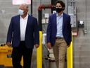 Prime Minister Doug Ford (left) and Prime Minister Justin Trudeau are pictured on August 21, 2020 when they announced that a 3M plant in Brockville would make N95 masks.