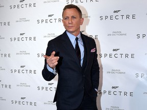 In this file photo taken on October 29, 2015, Daniel Craig poses during the French premiere of the new James Bond film 'Specter' in Paris.