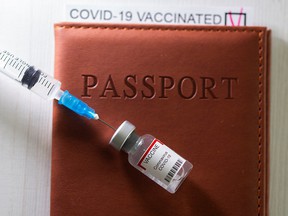 A syringe and a labeled vial 