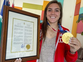 Olympic gold medalist Vanessa Gilles with the proclamation of September 14, 2021 as Vanessa Gilles Day in Ottawa.
