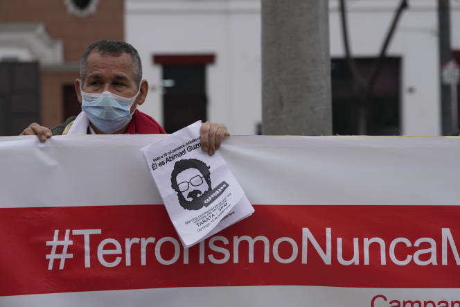 “No more terrorism”, it is written on the banner, during a demonstration celebrating the death of the founder of the Shining Path, Abimael Guzman, at 86 years old, on Saturday September 11, 2021, in Lima.