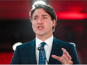 Canadian Prime Minister Justin Trudeau delivers his victory speech after the general election at the Queen Elizabeth Hotel in Montreal, Quebec, early September 21, 2021.
