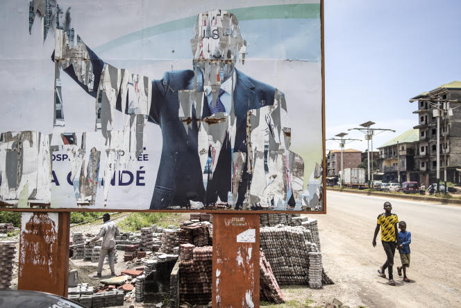 A torn poster on which appeared former Guinean President Alpha Condé, September 16, 2021 in Conakry.