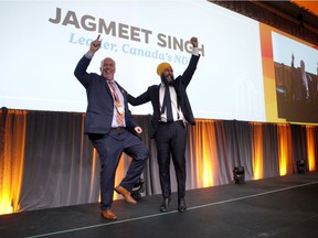 Federal NDP Leader Jagmeet Singh and BC Prime Minister John Horgan celebrate during the BC NDP Convention at the Victoria Convention Center in Victoria, BC on Saturday, November 23, 2019.