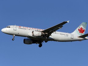 An Air Canada Airbus A320-200 airliner prepares to land at Vancouver International Airport in Richmond.