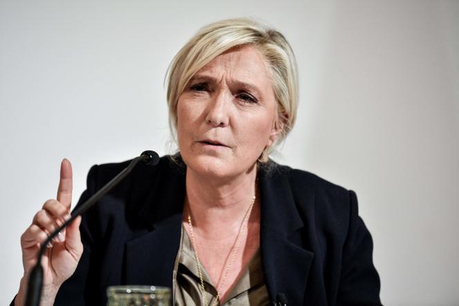 The candidate of the National Rally in the presidential election of 2022, Marine Le Pen, presents her bill on identity and immigration, in Paris, Tuesday, September 28.