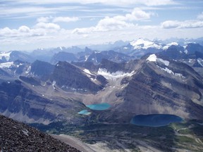 Upper Devon Lake, seen to the right in an undated brochure photo, is fed by Middle Devon Lake, a turquoise glacial lake in the northeast sector of Banff National Park.  New research says the distinctive milky turquoise color of many glacier-fed mountain lakes is slowly disappearing due to climate change.