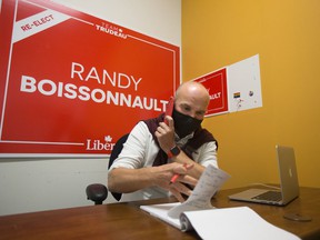 Edmonton Center Liberal candidate Randy Boissonnault in his campaign office Monday.  A final result in Tuesday's close race has yet to be declared, as the special ballot count is expected to carry over to Wednesday.