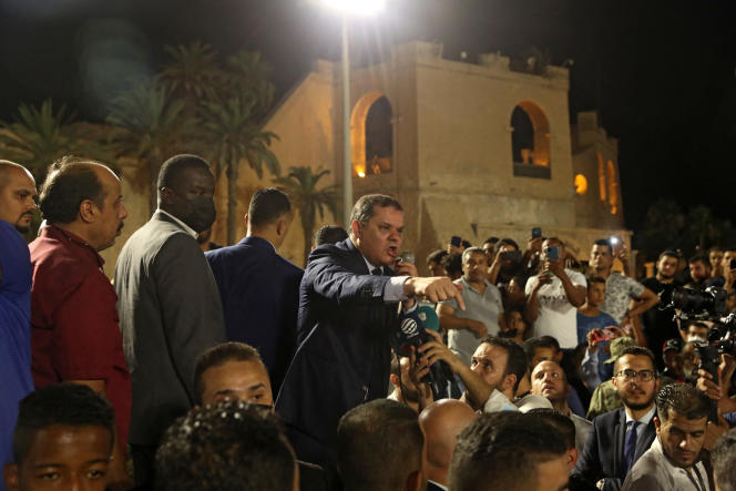 Libyan Prime Minister Abdelhamid Dbeibah addresses the crowd in Tripoli after the vote of a motion of censure against his government on September 21, 2021.