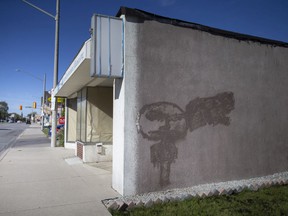 Graffiti covered on a building on Ottawa Street is seen on Thursday, Sept.30, 2021.