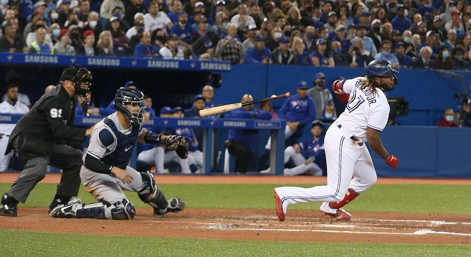 Blue Jay Vladimir Guerrero Jr. connects early in Game 1 of Tuesday night's series against the Yankees at the Rogers Center, where capacity has expanded to 30,000.