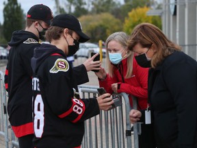 Fans arriving at the Canadian Tire Center Wednesday night.
