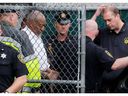 Actor and comedian Bill Cosby leaves the Montgomery County courthouse in handcuffs after being sentenced in his sexual assault trial in Norristown, Pennsylvania, USA, September 25, 2018.  