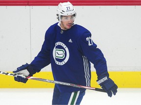 Travis Hamonic on the ice during Canucks training camp at Rogers Arena on January 11, 2021.