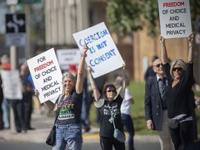 Protesters demanding an end to vaccine mandates hold a rally in front of the Windsor Regional Hospital - Met Campus on Wednesday, Sept. 29, 2021.