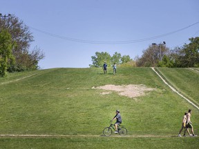 Visitors to the park enjoy 'Suicide Hill', the unofficial name for the hill next to Riverside Kiwanis Park in Windsor's Little River corridor.  Photographed on May 18, 2021.