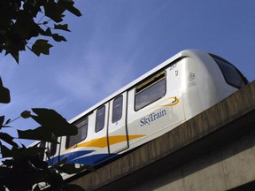 Metro Vancouver traffic police say a woman was attacked in SkyTrain on Monday after confronting a couple for not wearing masks.