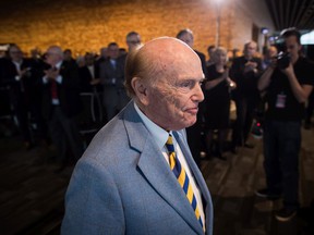 Businessman and philanthropist Jim Pattison returns to his seat after speaking during a Canadian Walk of Fame ceremony in his honor, in Vancouver, Friday, February 15, 2019.