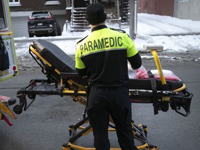 An Urgence Santé paramedic outside the Jean-Talon Hospital.