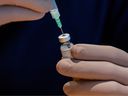 A healthcare worker prepares a dose of the Pfizer / BioNTech COVID-19 vaccine.