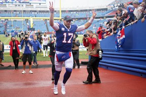 Josh Allen of the Buffalo Bills recognizes fans as he leaves the field after the Bills defeated the Texans 40-0 at Highmark Stadium.