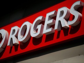 A sign is displayed outside a Rogers Communications retail store in Ottawa, July 20, 2017.