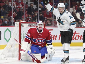 The Sharks' Jonathan Dahlen celebrates his teammate's second-period goal as the Canadiens goalkeeper watches helplessly Tuesday night at the Bell Center.
