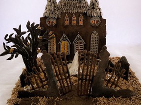 A haunted Victorian gingerbread mansion, complete with a spooky tree, a resident ghost bride, tombstones, and even miniature meringue bones.