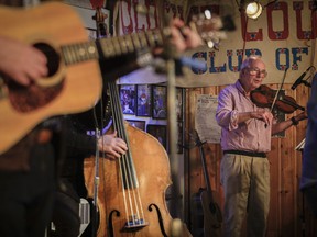 Violinist Bill Bland performs at Hillbilly Night at Wheel Club in Montreal on Monday, October 25, 2021. The club is celebrating its 55th anniversary, belatedly thanks to COVID.