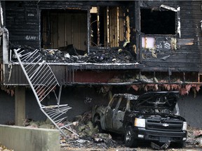 Extensive fire damage is visible at the scene of a fire at River Valley Apartments, 8630 106 Ave., in Edmonton on Saturday, October 23, 2021.