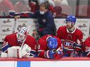 Montreal Canadiens Jake Allen, left, Ben Chiarot and Brett Kulak spend the last minute of their loss to the Carolina Hurricanes during the National Hockey League game in Montreal on Thursday, October 21, 2021. Team manager Pierre Gervais, look at the back.  (John Mahoney / MONTREAL GAZETTE) ORG XMIT: 51429 - 4115